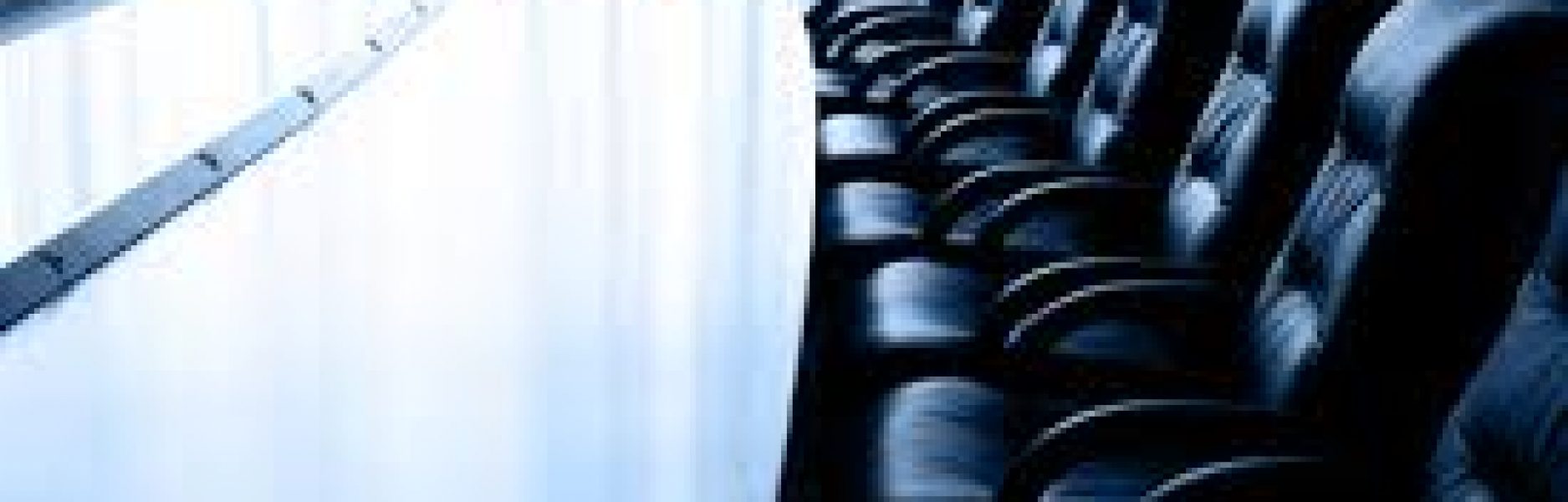 chairs lined up in a board room